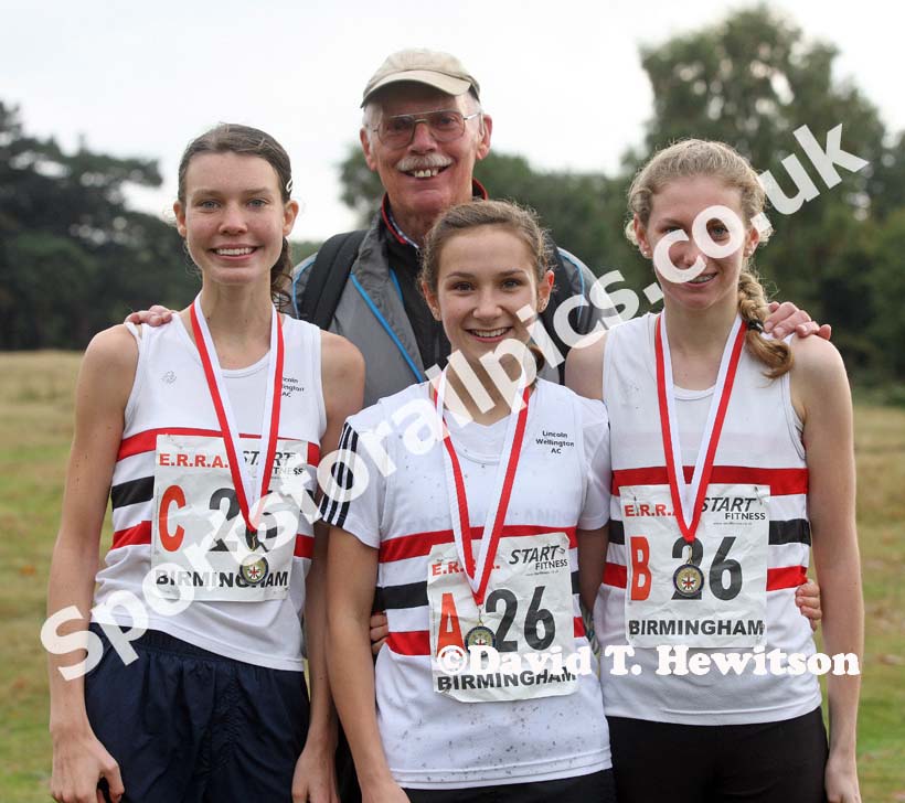 Lincoln Wellington AC winners of the under-17 women, from left to right: Rebekah Ward, Catrina Thomas and Abbie Donnelly with their coach Rob Lewis, ERRA Natioanl Athletes Road Relay. Photo: David T. Hewitson/Sports for All Pics